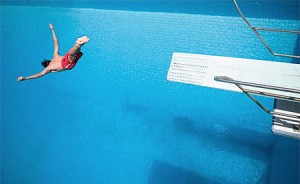 man-diving-into-pool